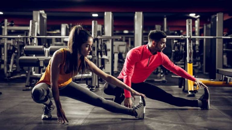 Chart showing YouFit gym membership prices and plan benefits for 2023